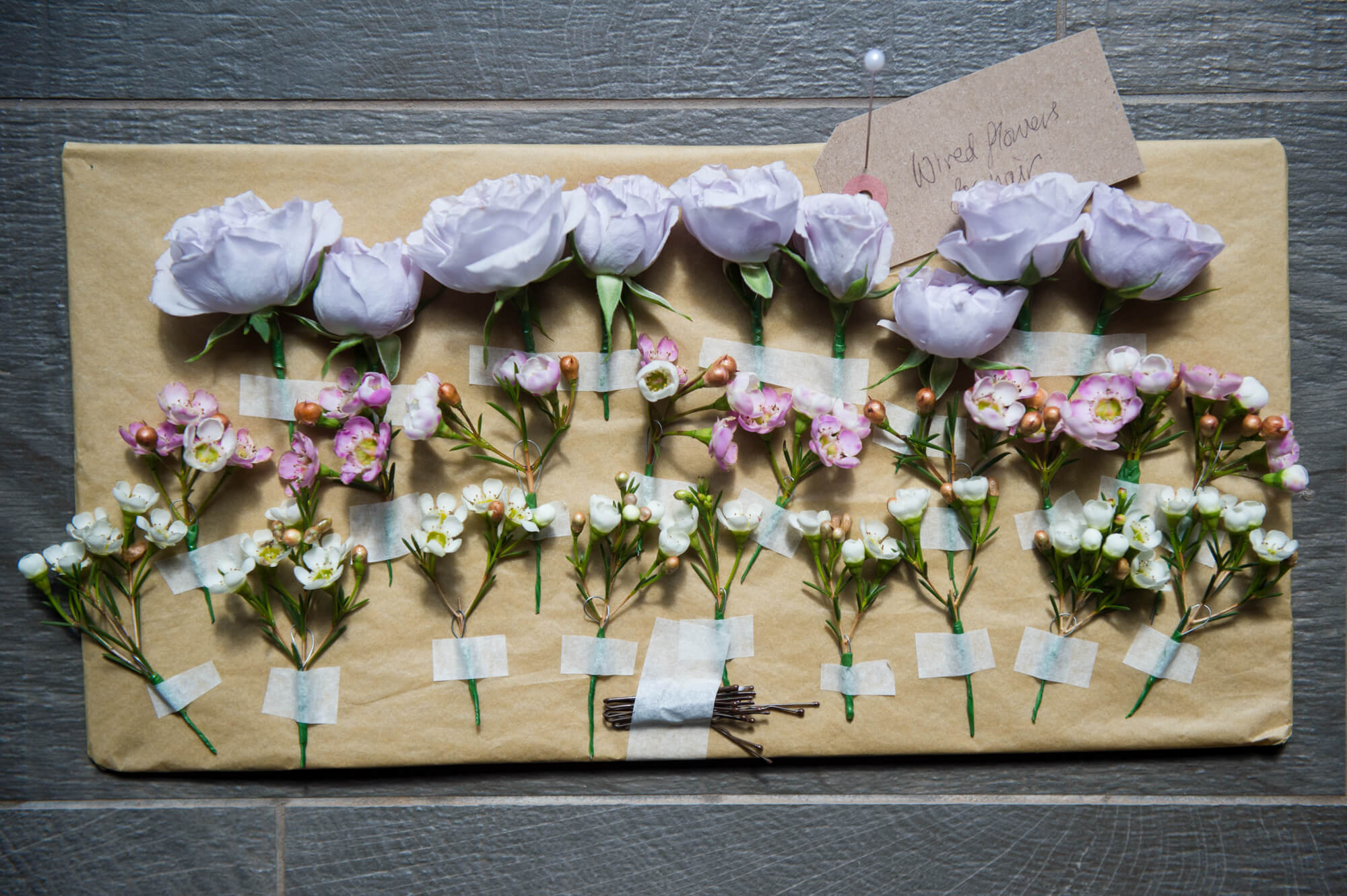 Flower button holes designed by Adelaide's Secret Garden